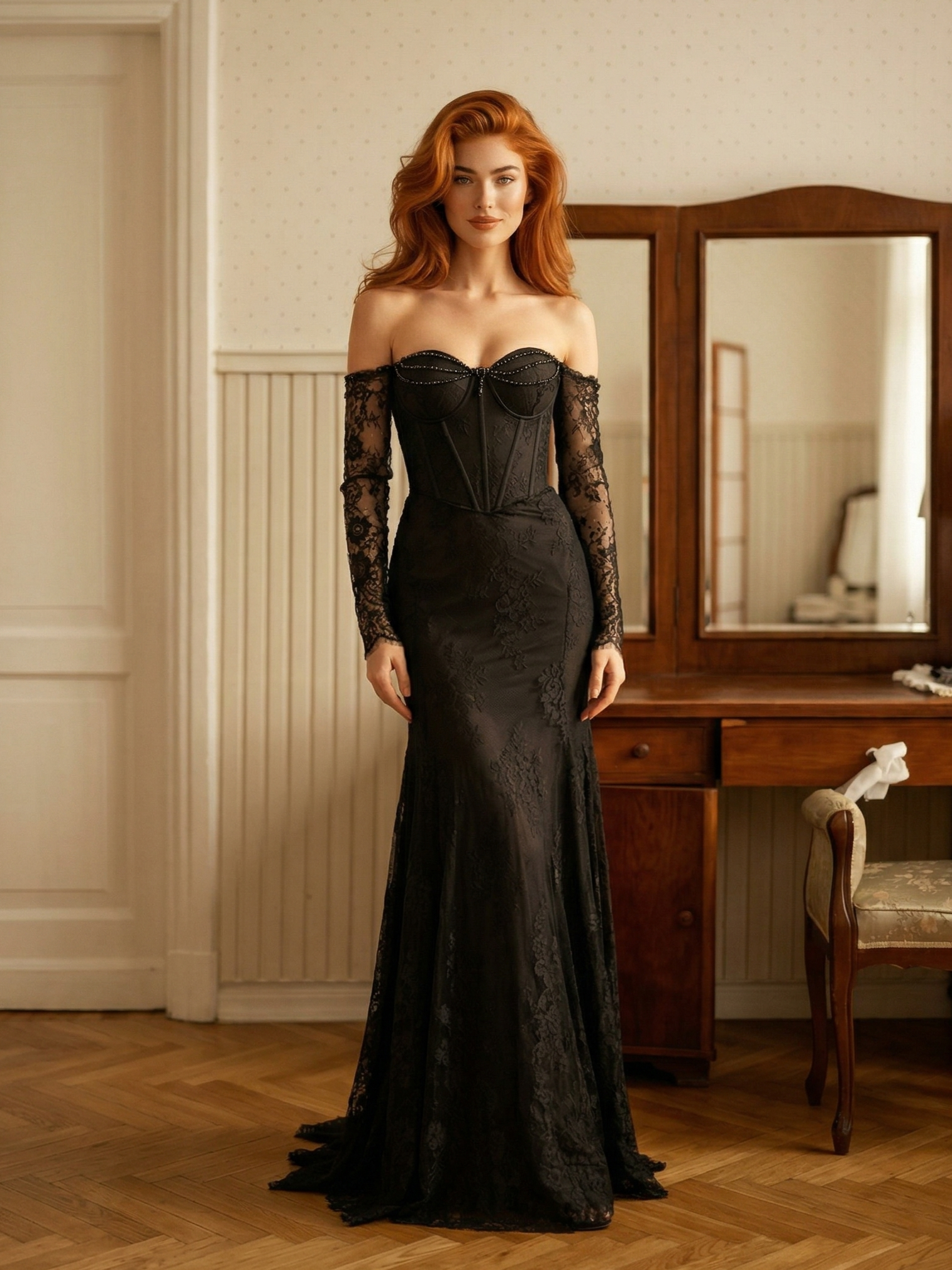 Черное кружевное платье-русалка с длинными рукавами и открытыми плечами. 
