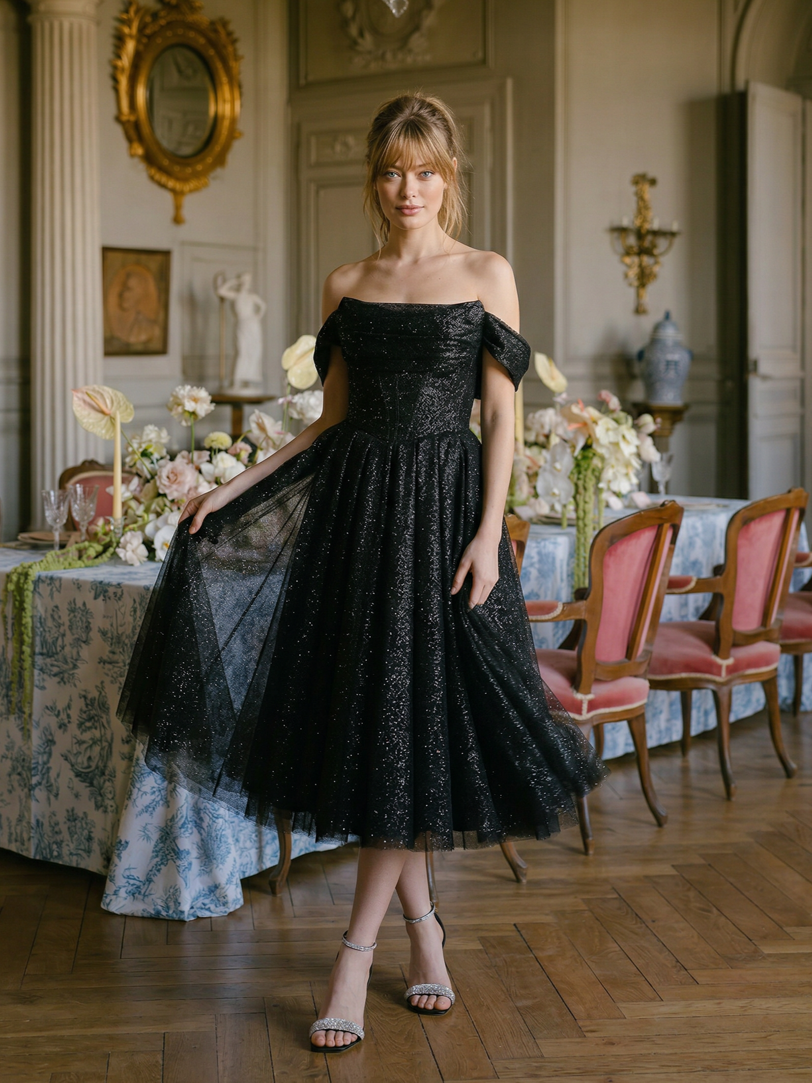 Черное блестящее платье миди с открытыми плечами и пышной юбкой