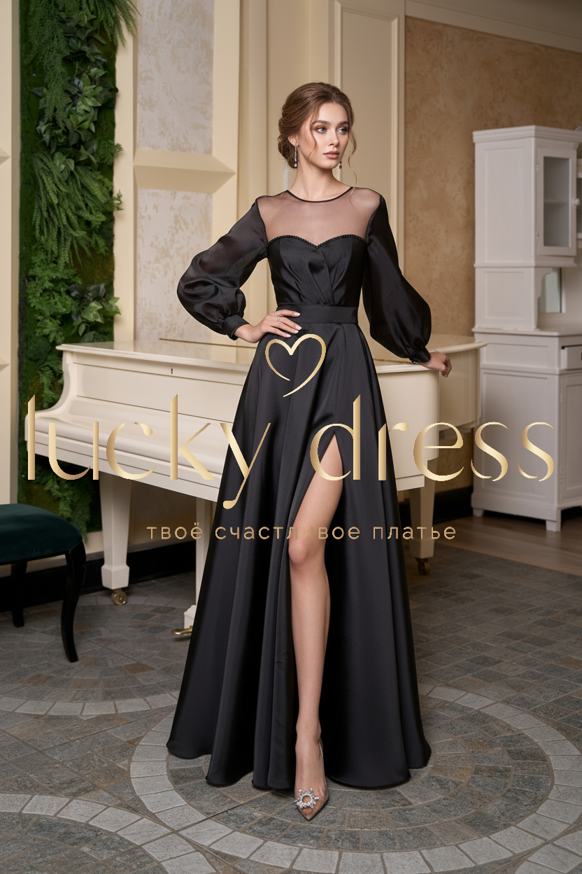 Черное платье из органзы с длинными рукавами и разрезом на ноге