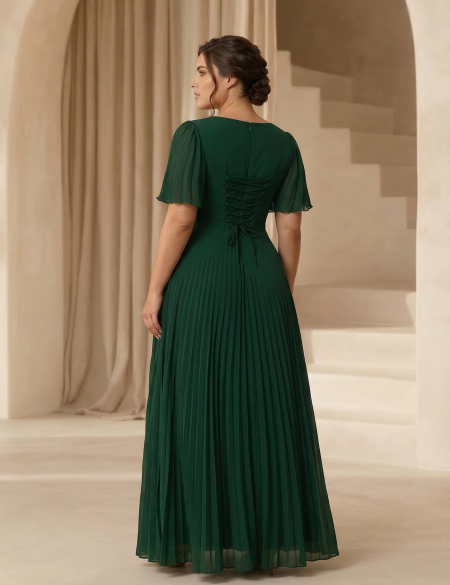 Изумрудное платье с плиссированной юбкой и рукавами-крылышками