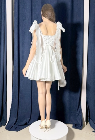 Белое платье из органзы с бантиками